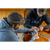 Over head photo of two men playing cribbage. Both men are wearing Stormy Kromer caps and hooded sweatshirts.