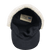 Inside view of Stormy Kromer Bergland Cap showing black lining and large branded woven label.