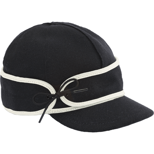 Side view of The Sidekick Cap: a wool, six-panel winter cap with a pulldown earband, brim and off-centered tie.