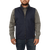 On model front view of the Ironwood Vest: A zip front wool vest with a stand collar and side pockets.