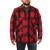 On model, front view of the Mackinaw Coat: A collared, button-front wool coat with six large pockets on the front.