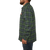 On model side view of the Camp Shirt Jack: A lined, plaid flannel overshirt with snap front, two chest pockets with snap closure and two side pockets.