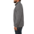 On model, side view of the Forge Quarter Zip: A quarter-zip men's pullover with raglan sleeves and a left chest zip pocket.