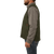 On model side view of the Button Vest: A traditional button-front wool vest with large patch pockets on the front.