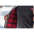 Close up detail of a person wearing the Waxed Button Vest, holding the vest open revealing the plaid lining.