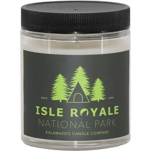 Glass jar candle from Kalamazoo Candle with black lid and label, printed with a Isle Royale drawing in bright green