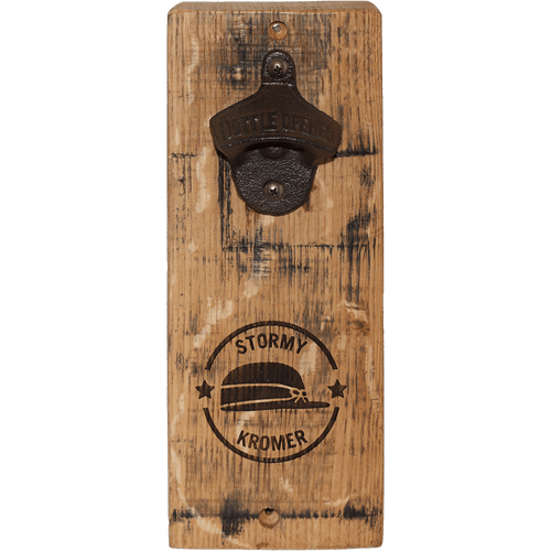 Rustic, wall-mounted, wood stave bottle opener with a Stormy Kromer graphic burned into the wood