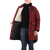 Classic coat with zipper and snap closure storm flap with berber lining and knit cuffs, mid-thigh length in black/red tartan plaid on a woman, inside view