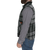  Full-zip wool vest with front pockets in a green and gray plaid on a man with beard, side view